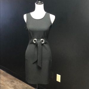 Classic Black Sleeveless Sheath Dress with Grommet Tie